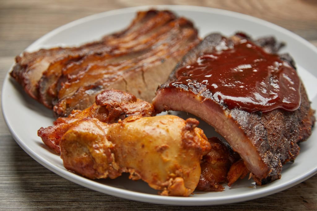 Plate of barbecued meats and ribs.