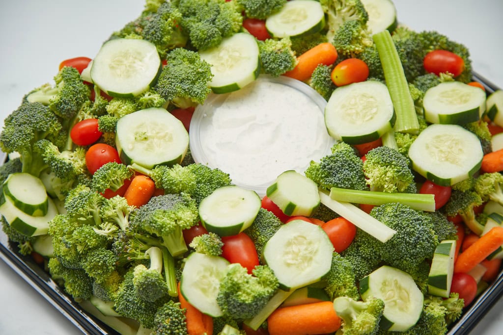 Vegetable platter with dipping sauce.