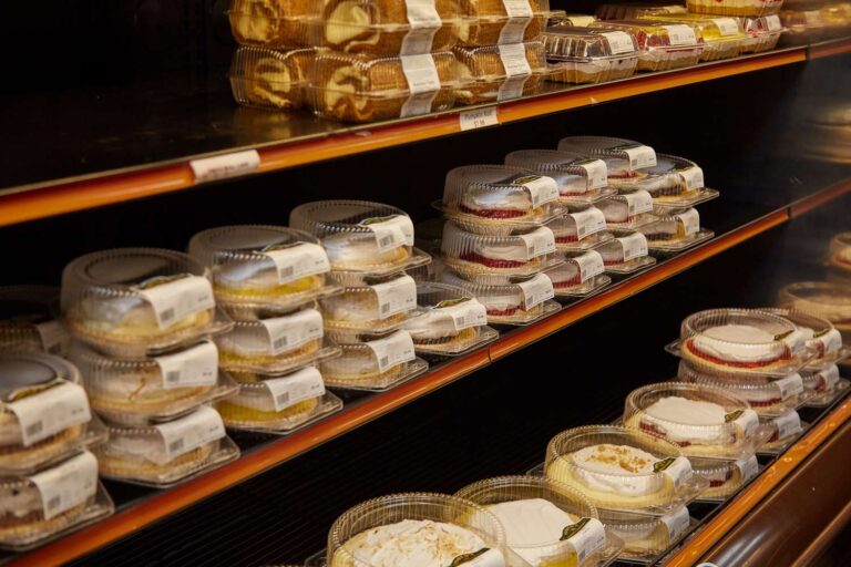 Assorted packaged cakes on store shelves