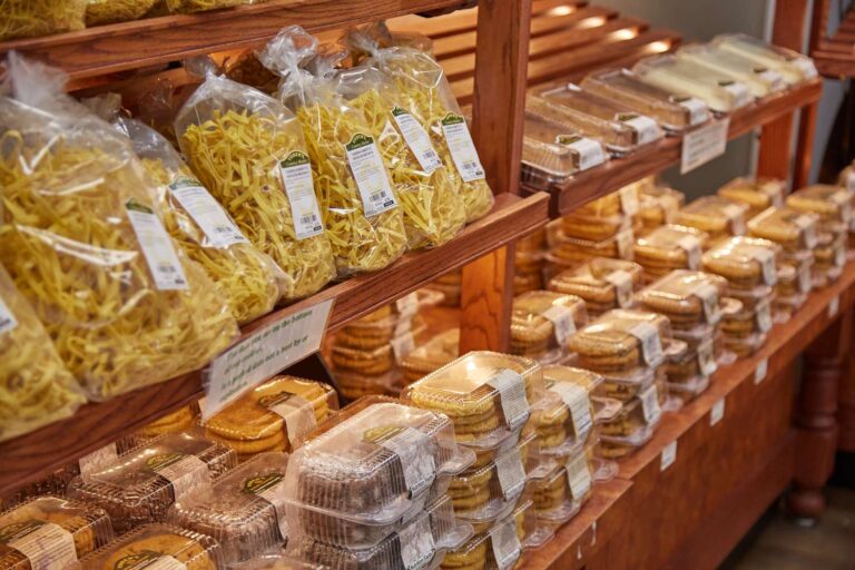 Shelves with pasta and baked goods displayed