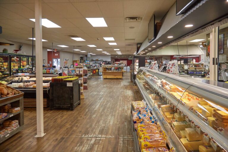 Interior of a grocery store with various food displays.
